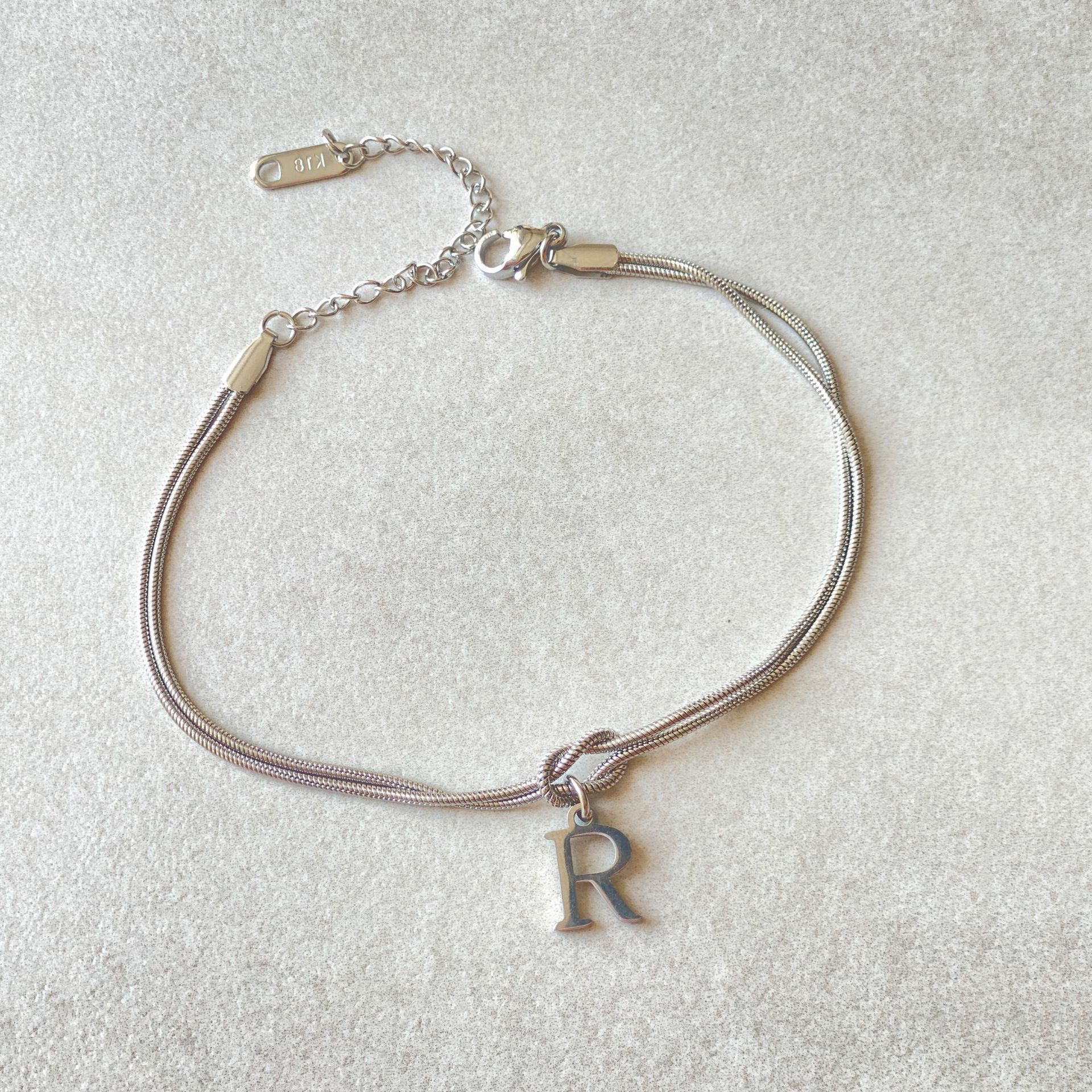 Bracelet Nœud d'Amour A-Z – Élégance Personnalisée &  Acier Inoxydable