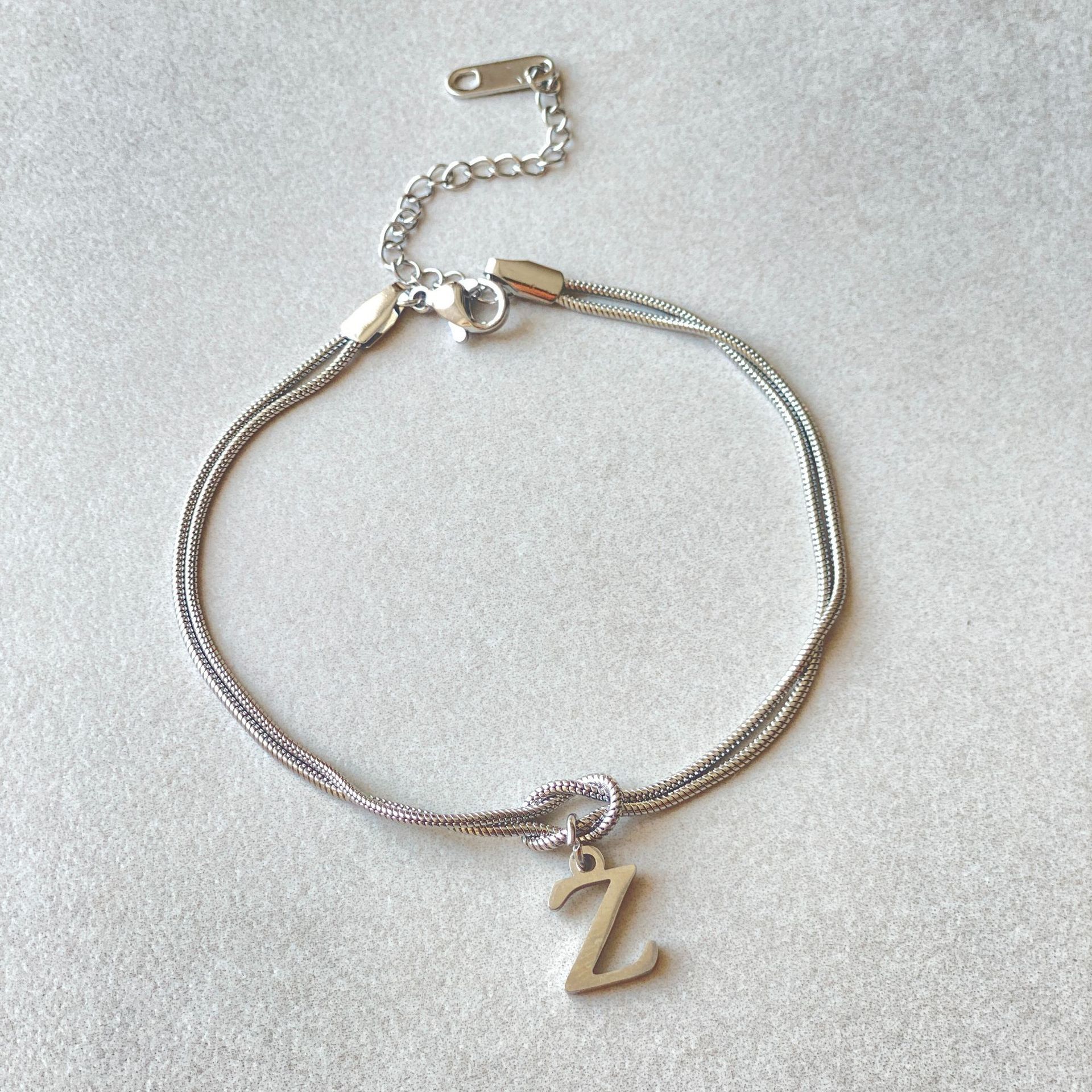 Bracelet Nœud d'Amour A-Z – Élégance Personnalisée &  Acier Inoxydable