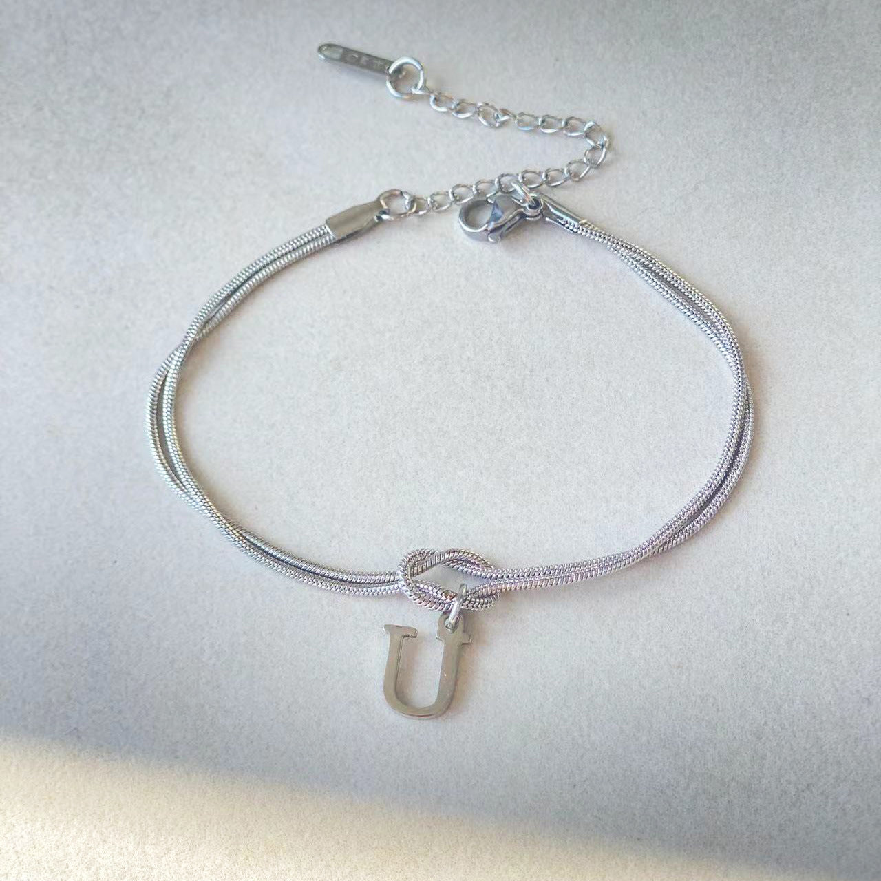 Bracelet Nœud d'Amour A-Z – Élégance Personnalisée &  Acier Inoxydable