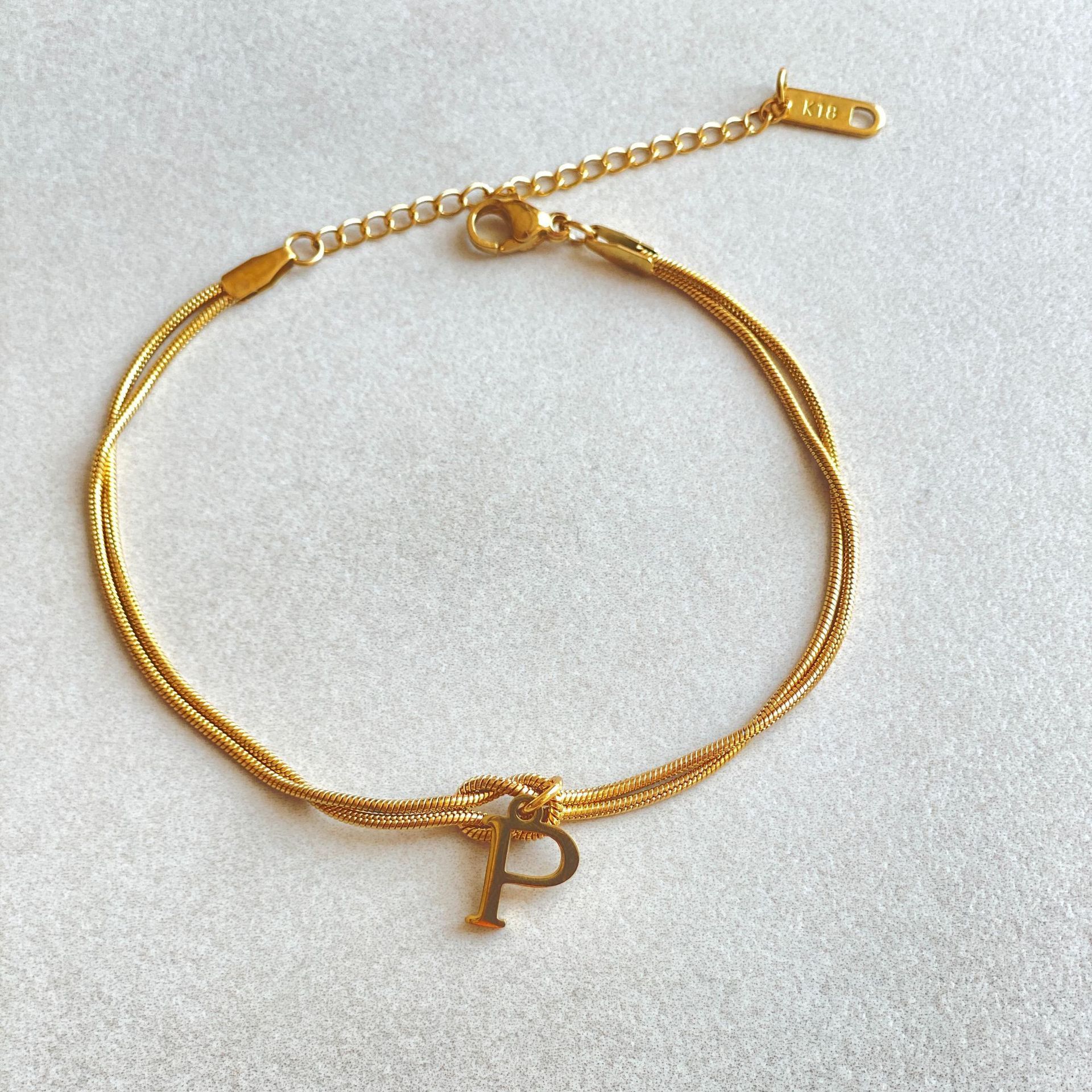 Bracelet Nœud d'Amour A-Z – Élégance Personnalisée &  Acier Inoxydable