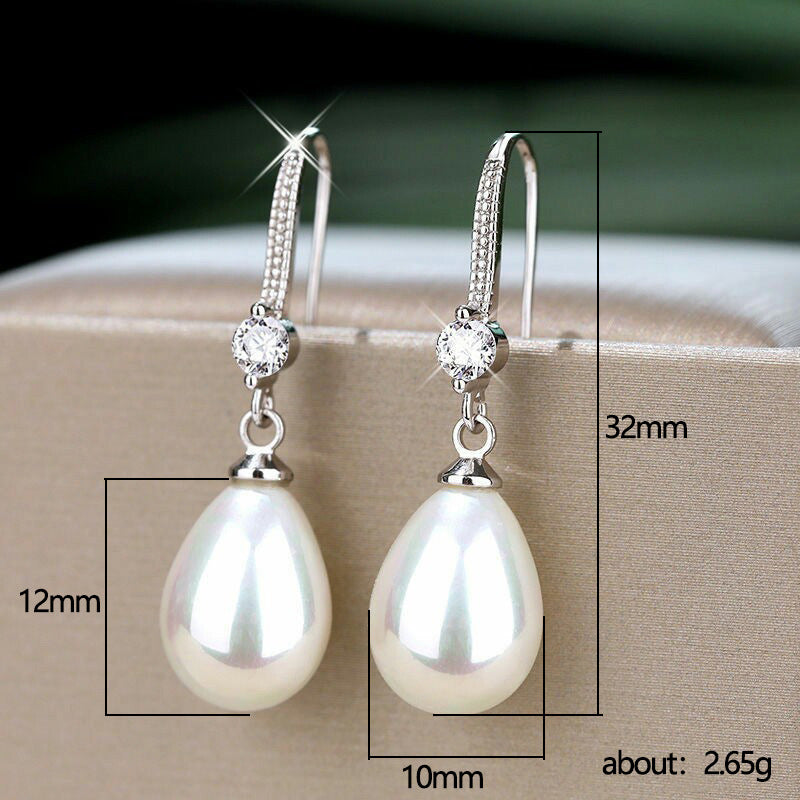 Boucles d’Oreilles Goutte d’Élégance – Perles d’Imitation &  Finition Dorée