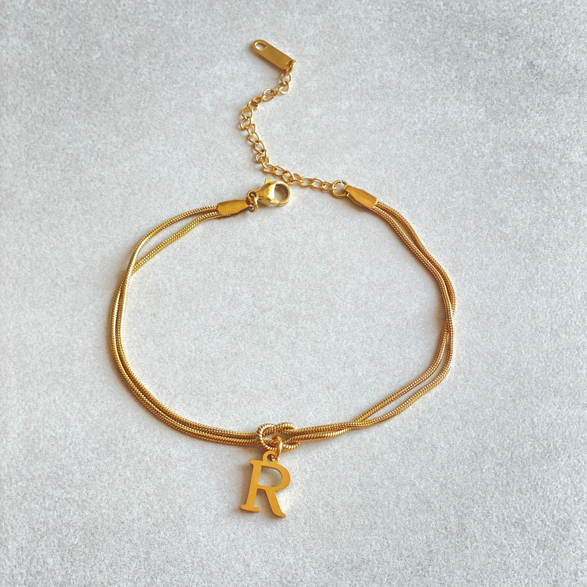 Bracelet Nœud d'Amour A-Z – Élégance Personnalisée &  Acier Inoxydable