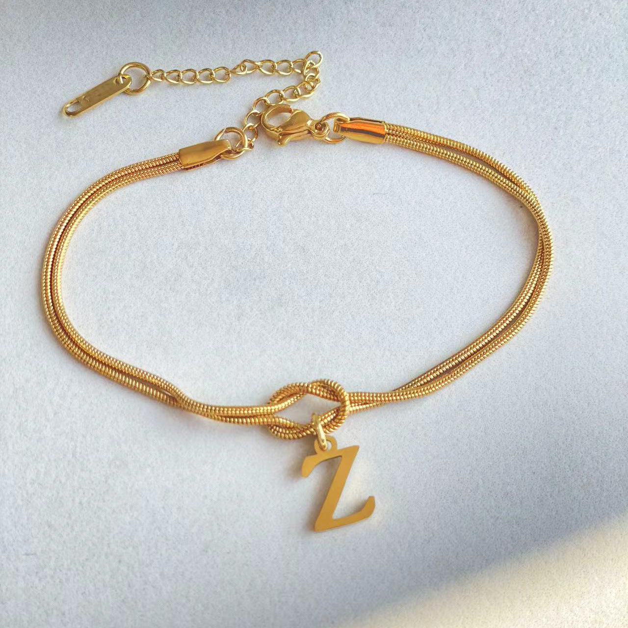 Bracelet Nœud d'Amour A-Z – Élégance Personnalisée &  Acier Inoxydable